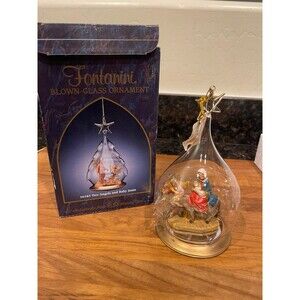 Fontanini Nativity “Flight Into Egypt” Blown Glass ornament